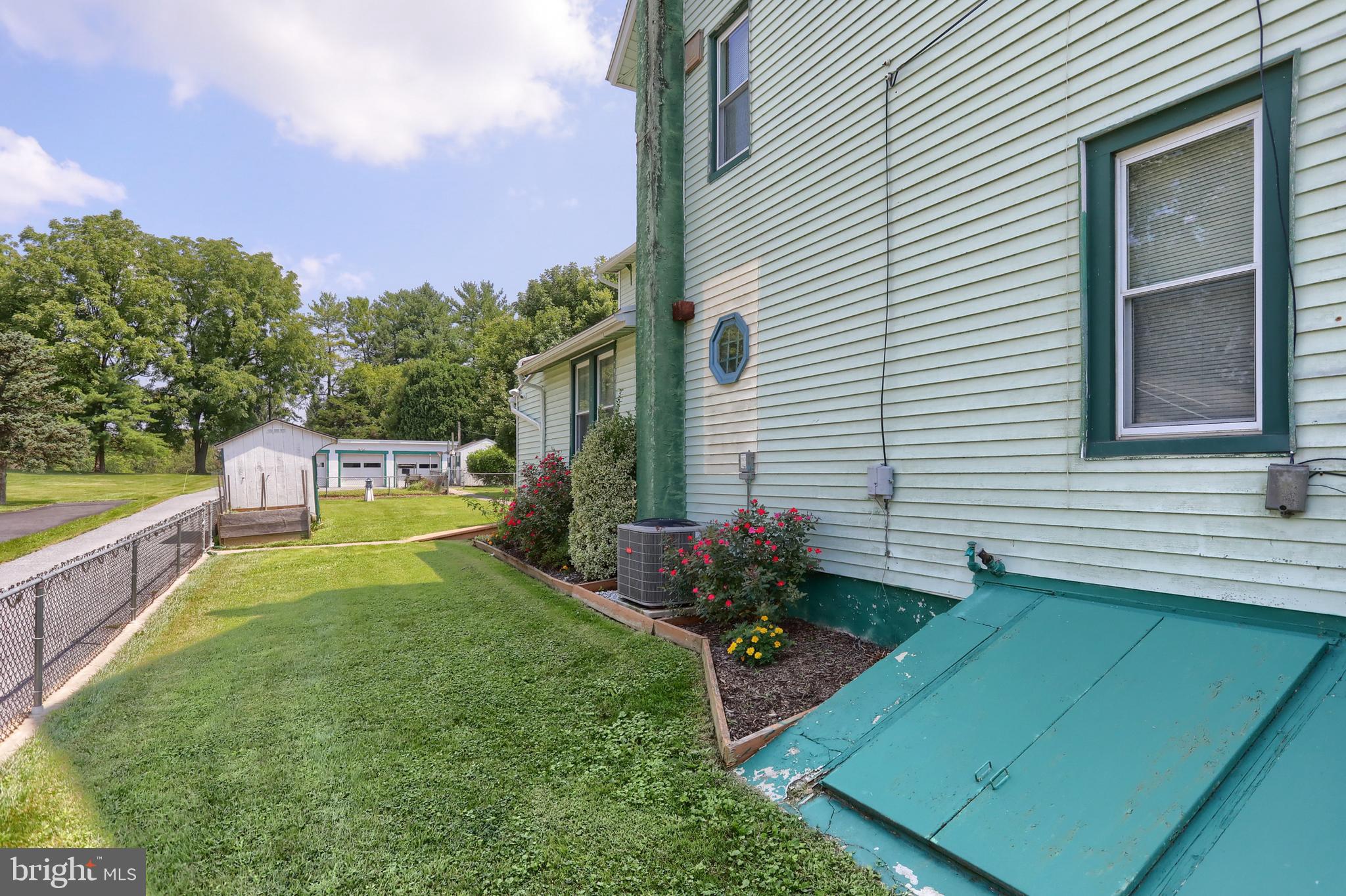 13 Montello Road Reading, PA 19608 - Photo 54 of 54 a view of a house with a backyard and a tub