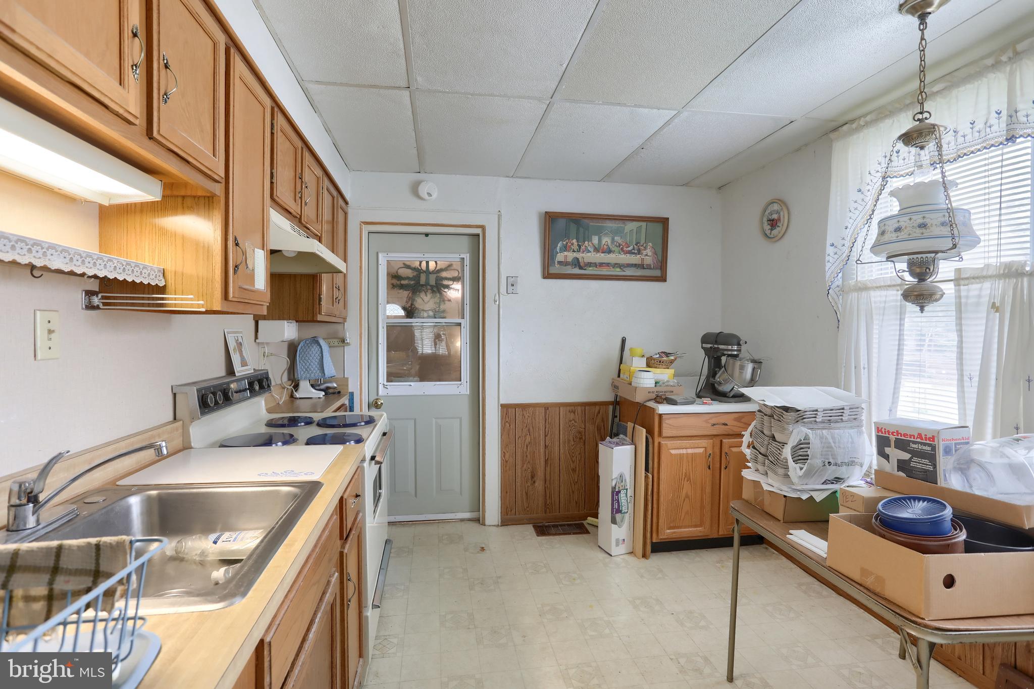 13 Montello Road Reading, PA 19608 - Photo 10 of 54 a kitchen that has a sink and a stove