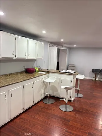 a kitchen with stainless steel appliances a refrigerator stove and sink