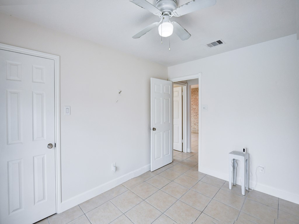 1306 Mimosa Road Missouri City, TX 77489 - Photo 17 of 24 Bedroom 2