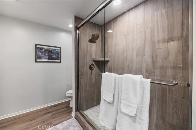 a bathroom with a shower and a shower