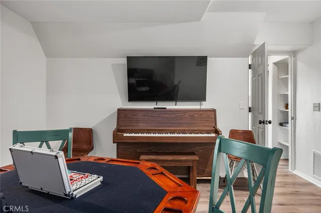 a living room with a couch and a flat screen tv