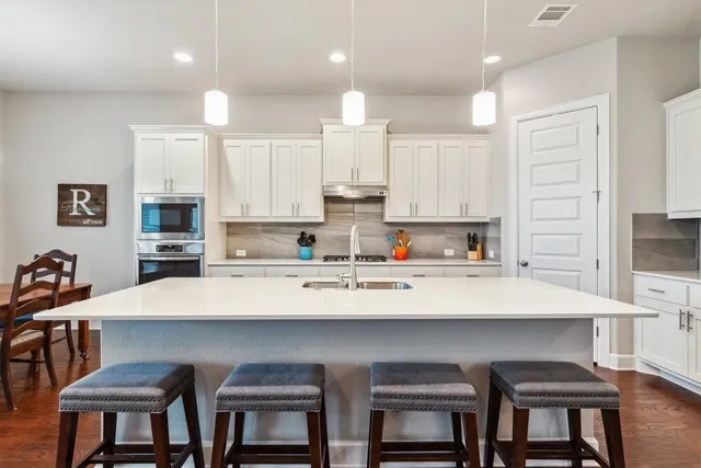 a view of kitchen with breakfast area