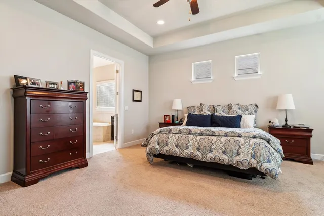 a bedroom with a bed and a closet