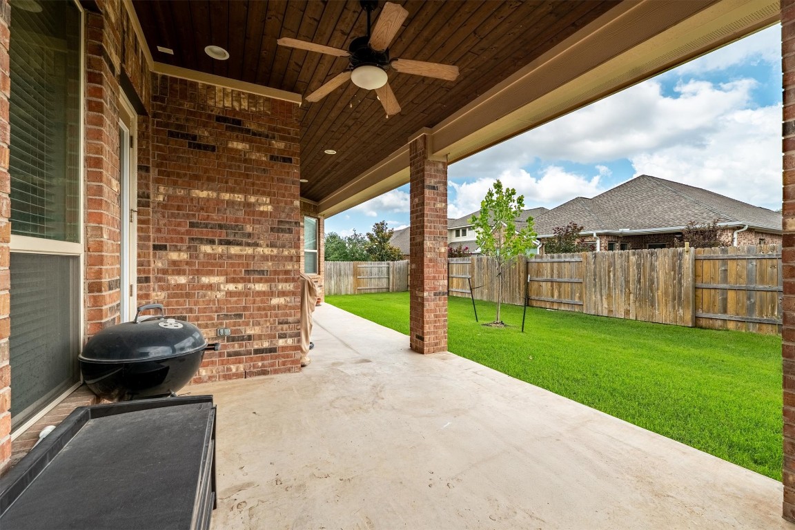 1005 Hezekiah Lane Leander, TX 78641 - Photo 33 of 36 a view of a porch with furniture and a yard