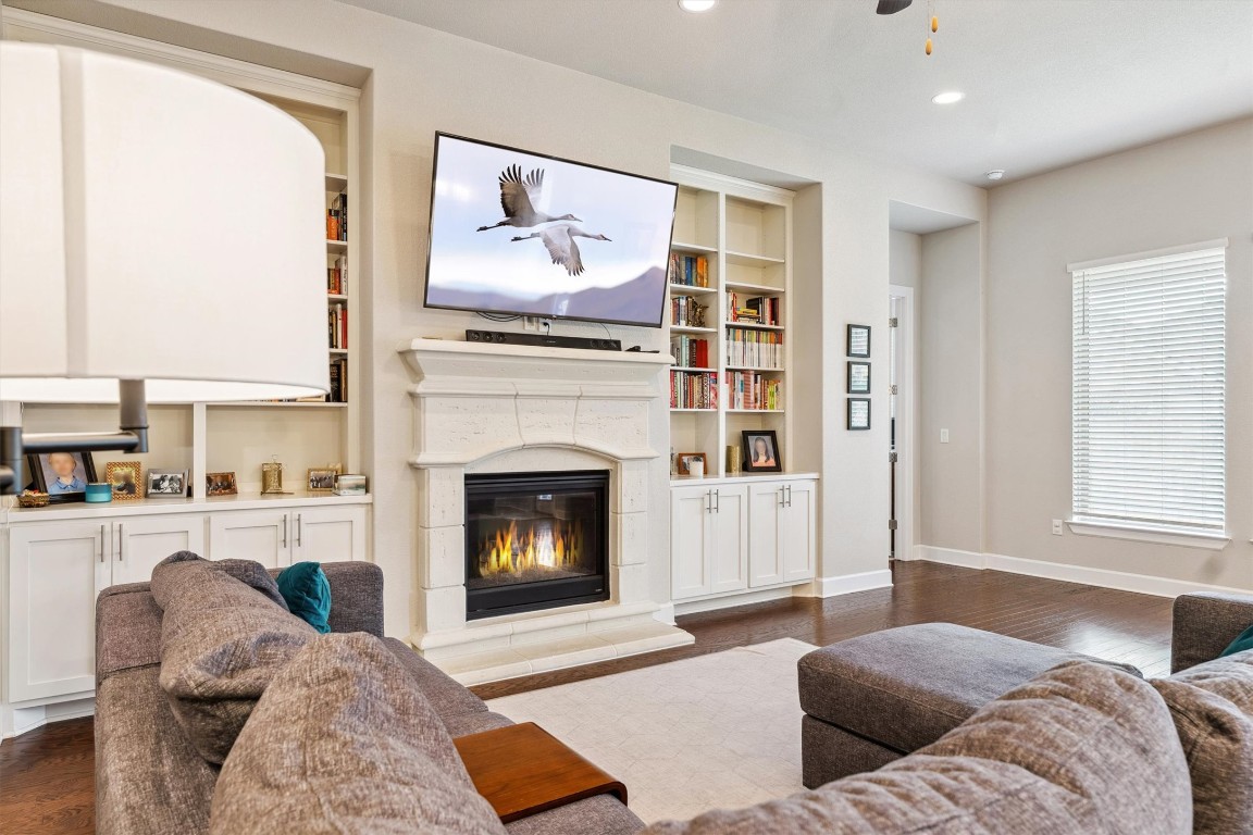 1005 Hezekiah Lane Leander, TX 78641 - Photo 10 of 36 a living room with furniture and a fireplace