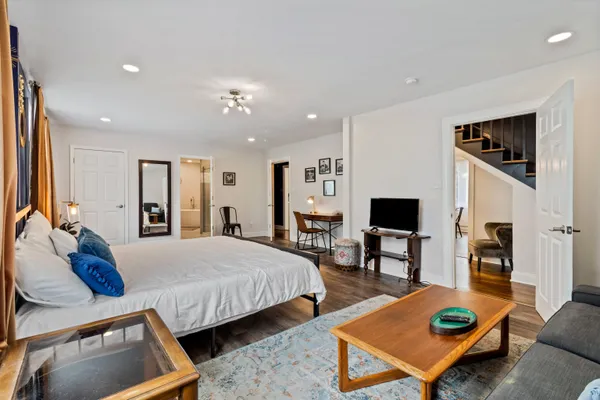 a living room with furniture and a table