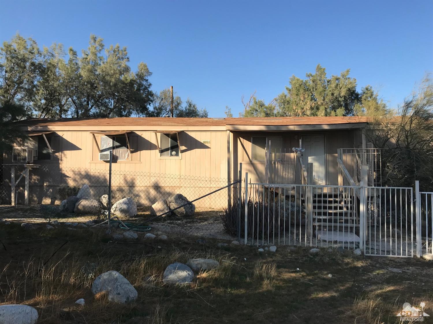 15774 Country View Road Whitewater, CA 92282 - Photo 1 of 16 a view of back yard of the house
