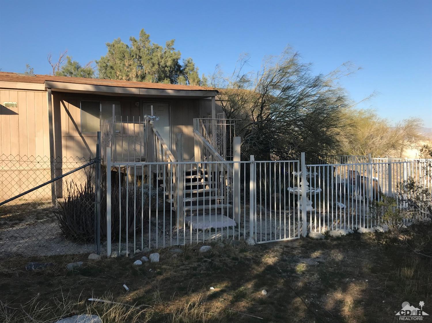 15774 Country View Road Whitewater, CA 92282 - Photo 2 of 16 a view of a wooden fence