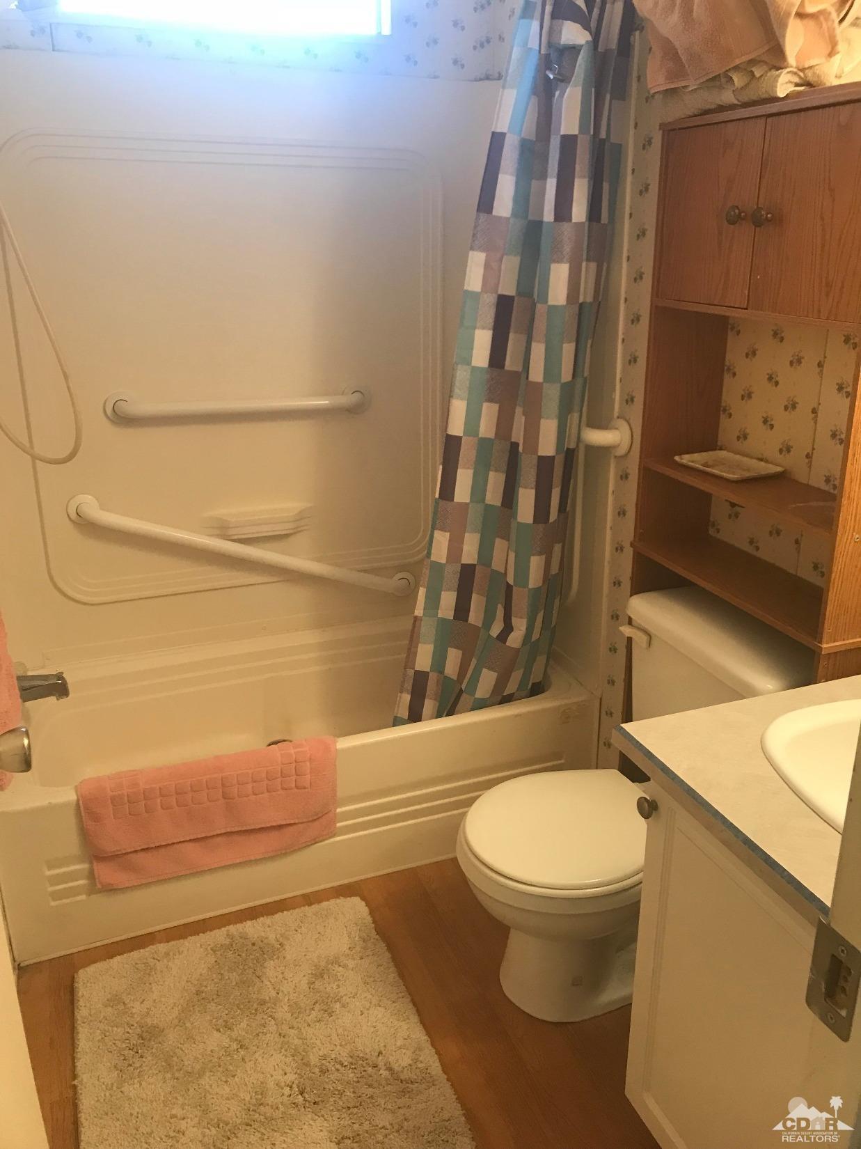 15774 Country View Road Whitewater, CA 92282 - Photo 14 of 16 a bathroom with a toilet and a shower
