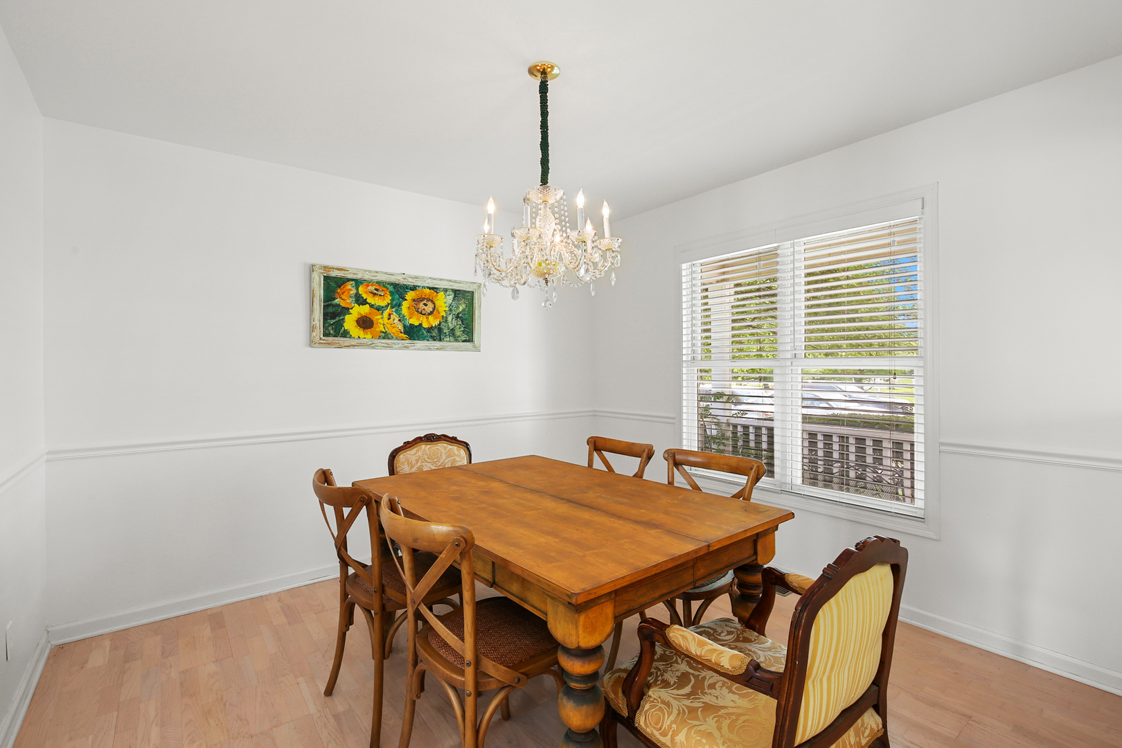 350 East Munz Road Crete, IL 60417 - Photo 14 of 34 a view of a dining room with furniture and chandelier