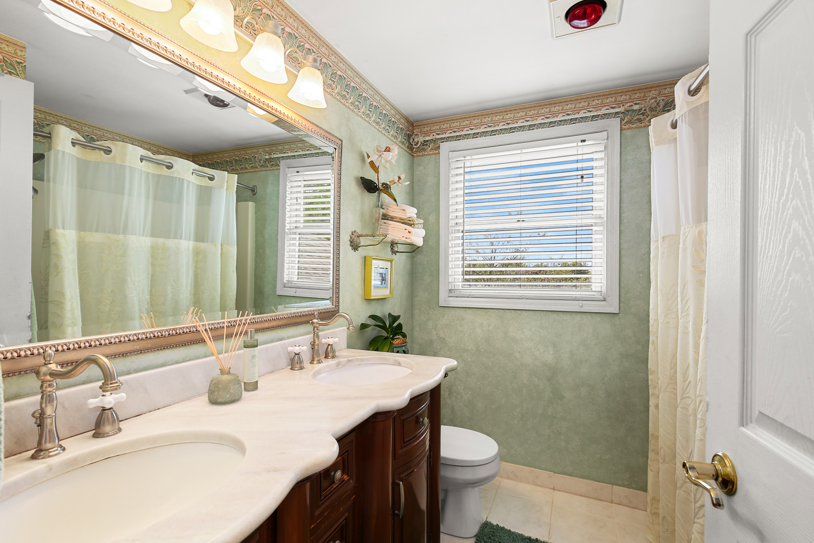 350 East Munz Road Crete, IL 60417 - Photo 18 of 34 a bathroom with a granite countertop sink toilet a large mirror and shower