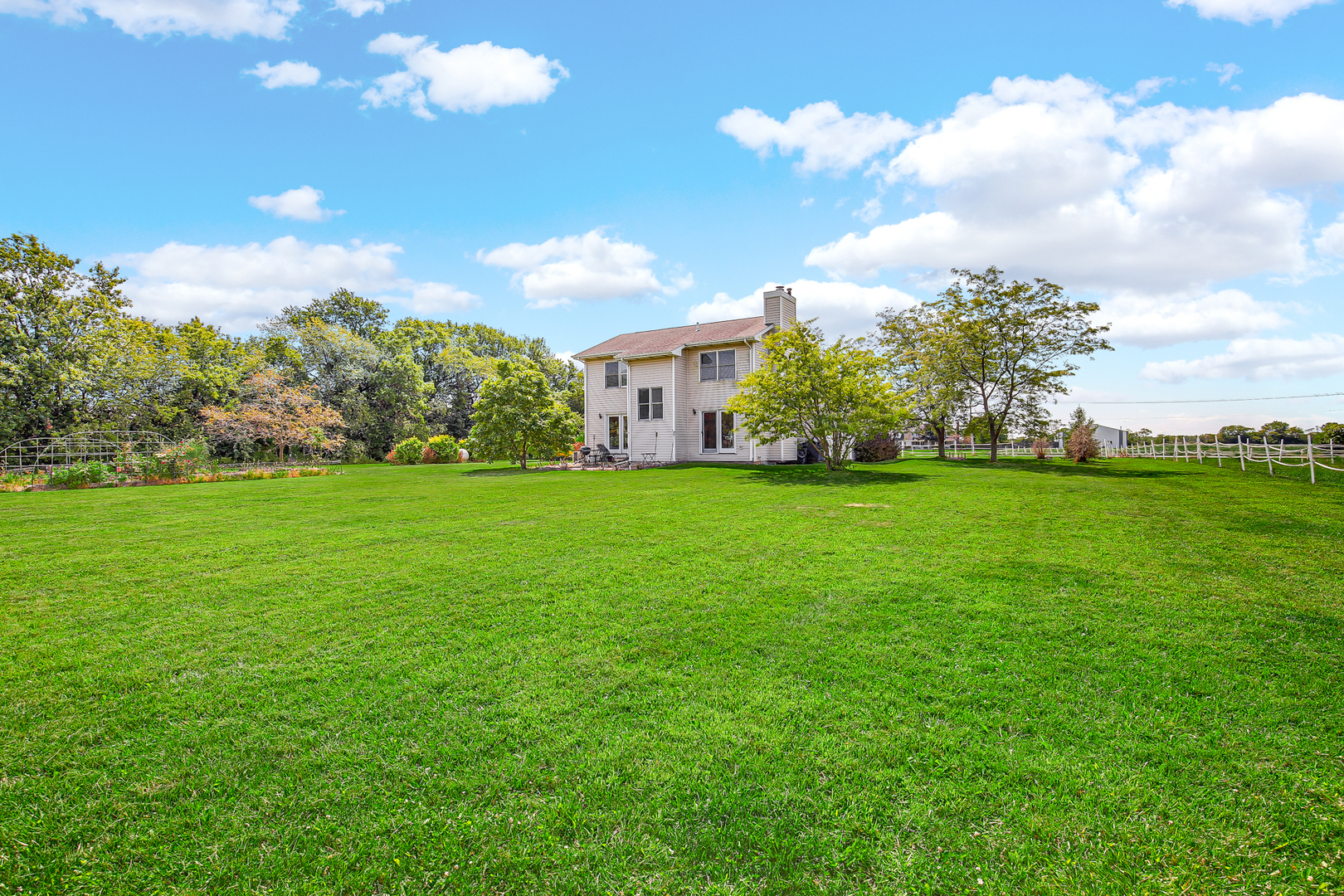 350 East Munz Road Crete, IL 60417 - Photo 28 of 34 a view of a house with a big yard