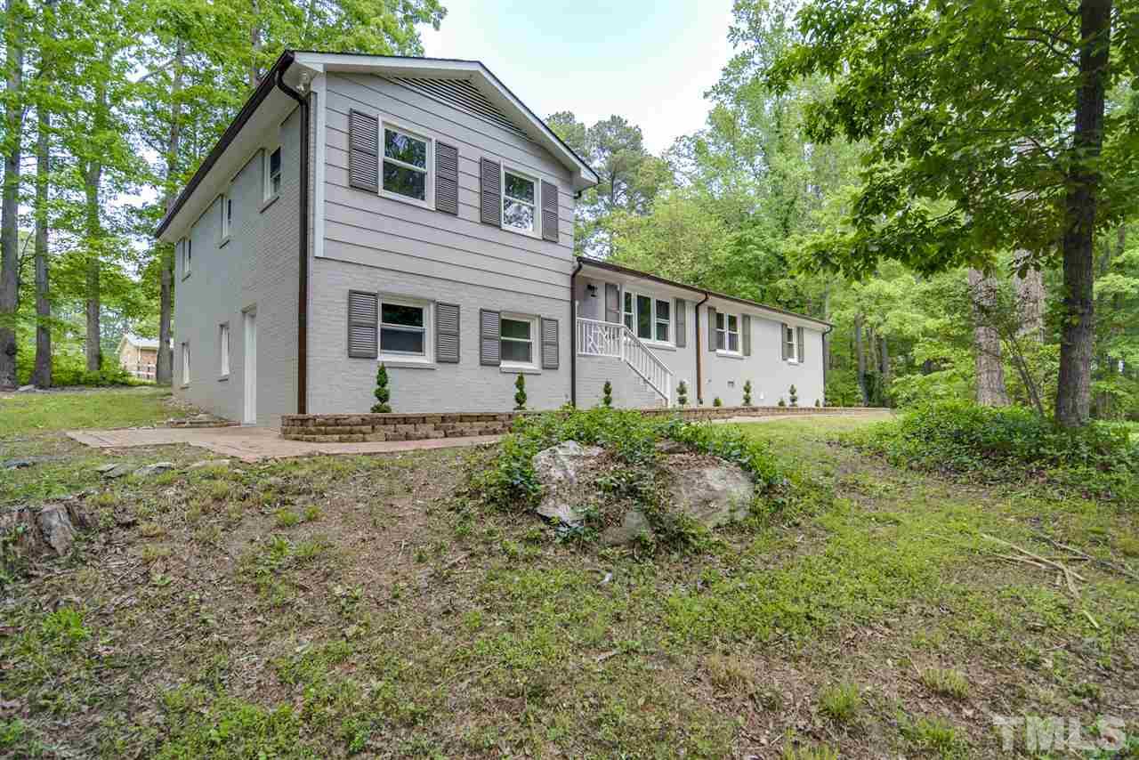 131 Lin Tilley Road Durham, NC 27712 - Photo 3 of 25 a view of a house with a yard