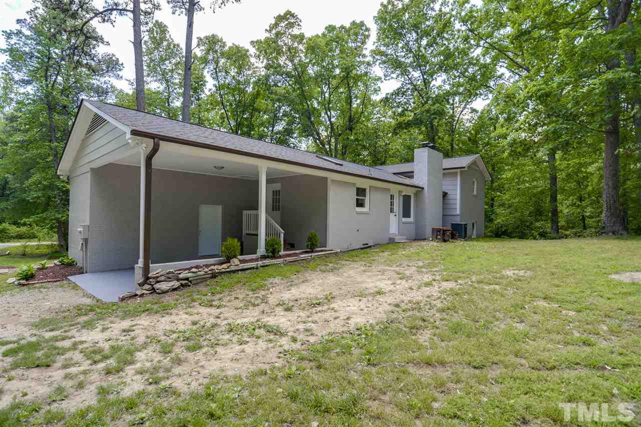131 Lin Tilley Road Durham, NC 27712 - Photo 6 of 25 a view of a back yard of the house