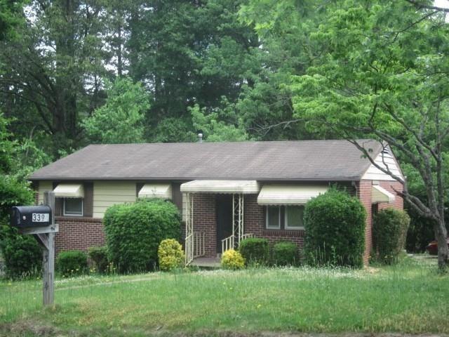 3394 Renault Road Southeast Atlanta, GA 30354 - Photo 1 of 1 a view of a house with a yard and plants