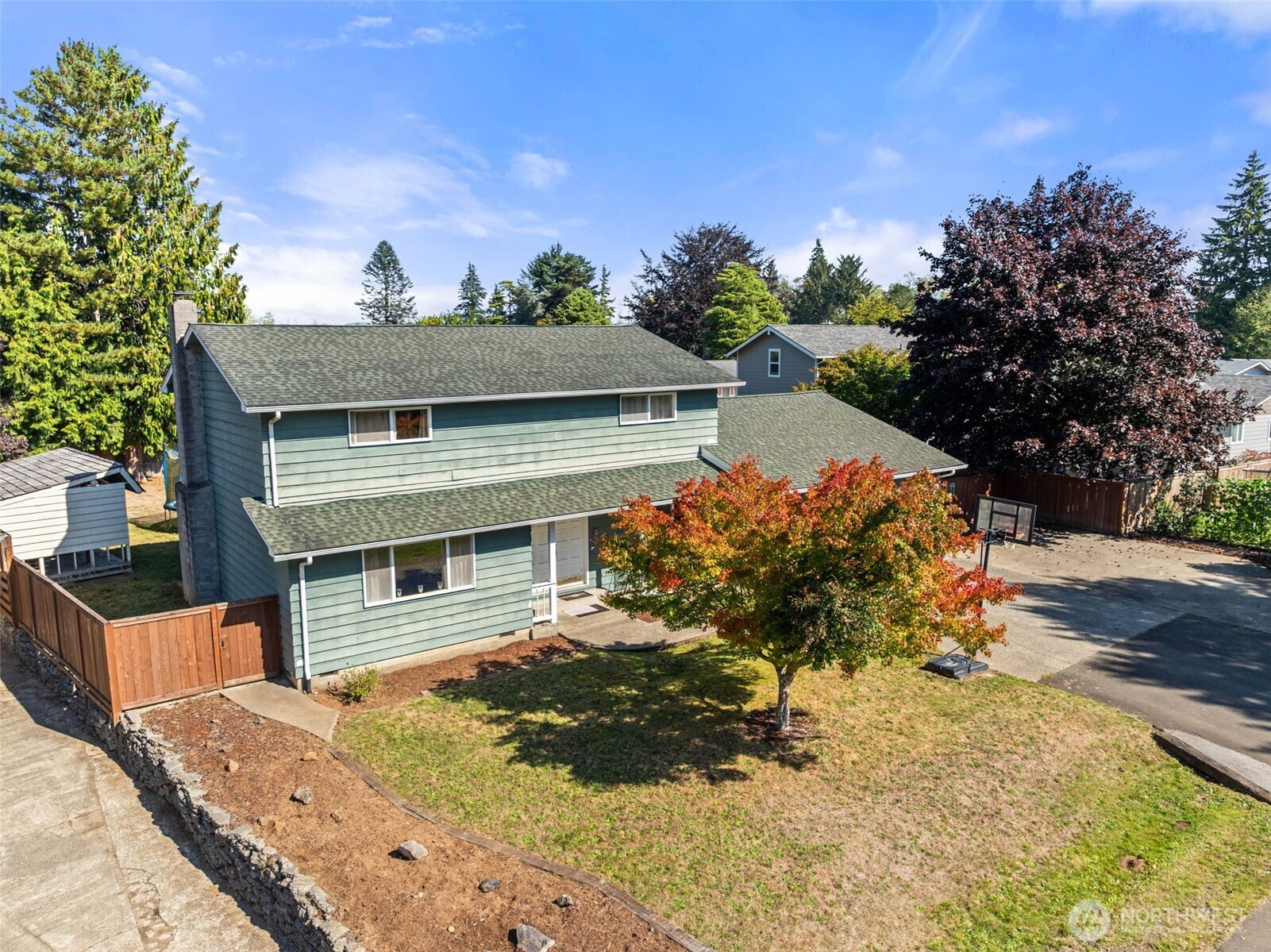 front view of a house with a yard