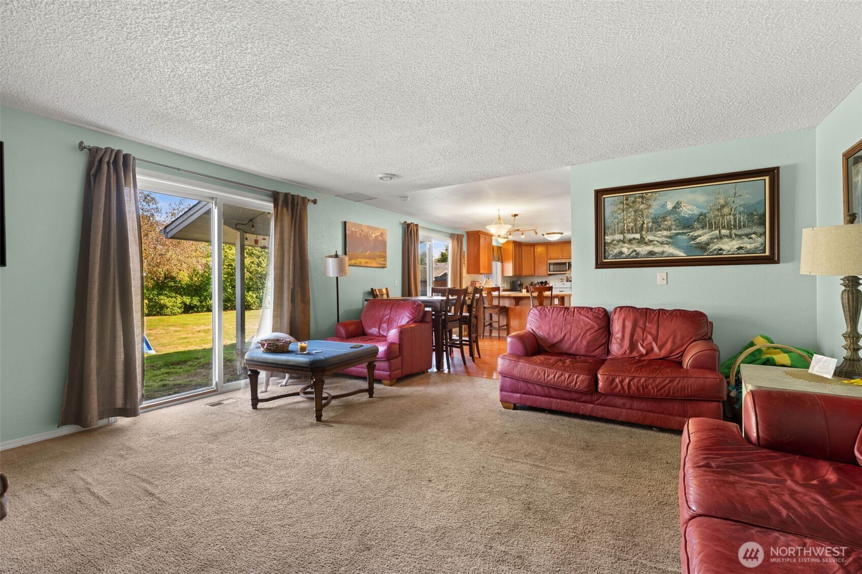 1420 Dundee Drive Cosmopolis, WA 98537 - Photo 16 of 40 a living room with furniture and a large window
