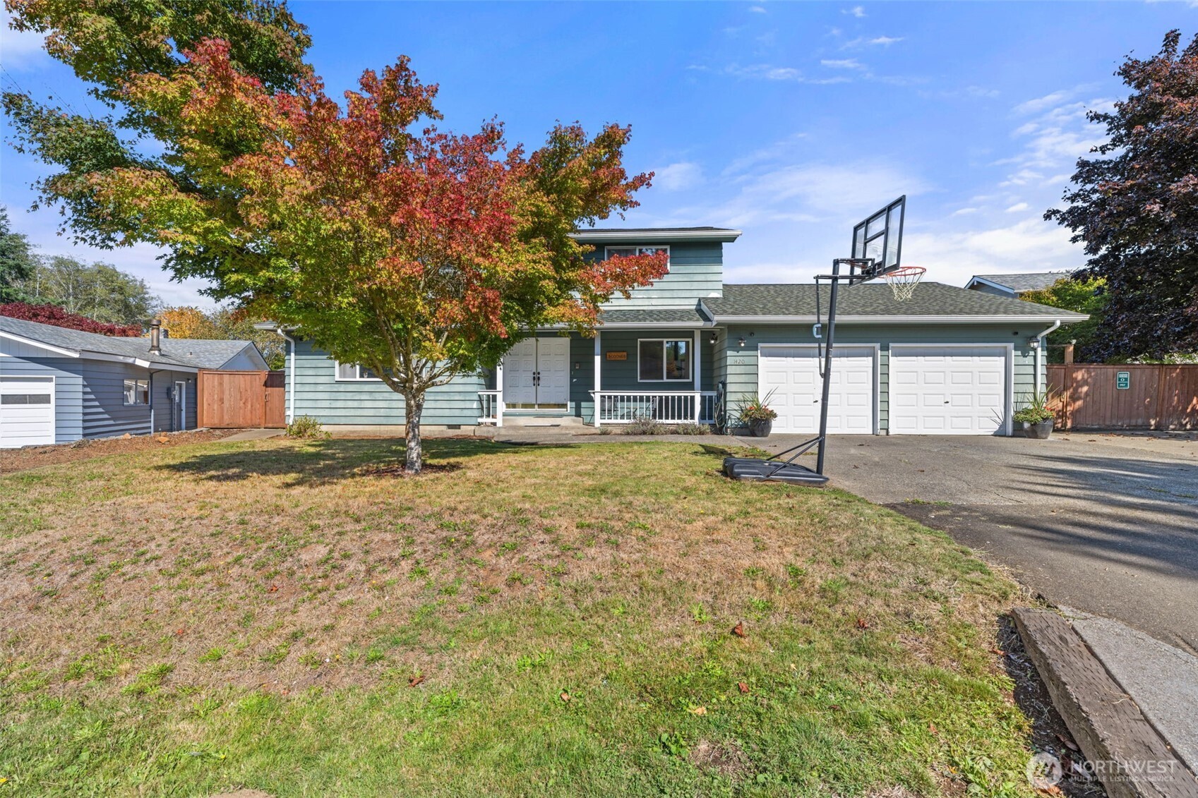 1420 Dundee Drive Cosmopolis, WA 98537 - Photo 2 of 40 a front view of a house with a yard