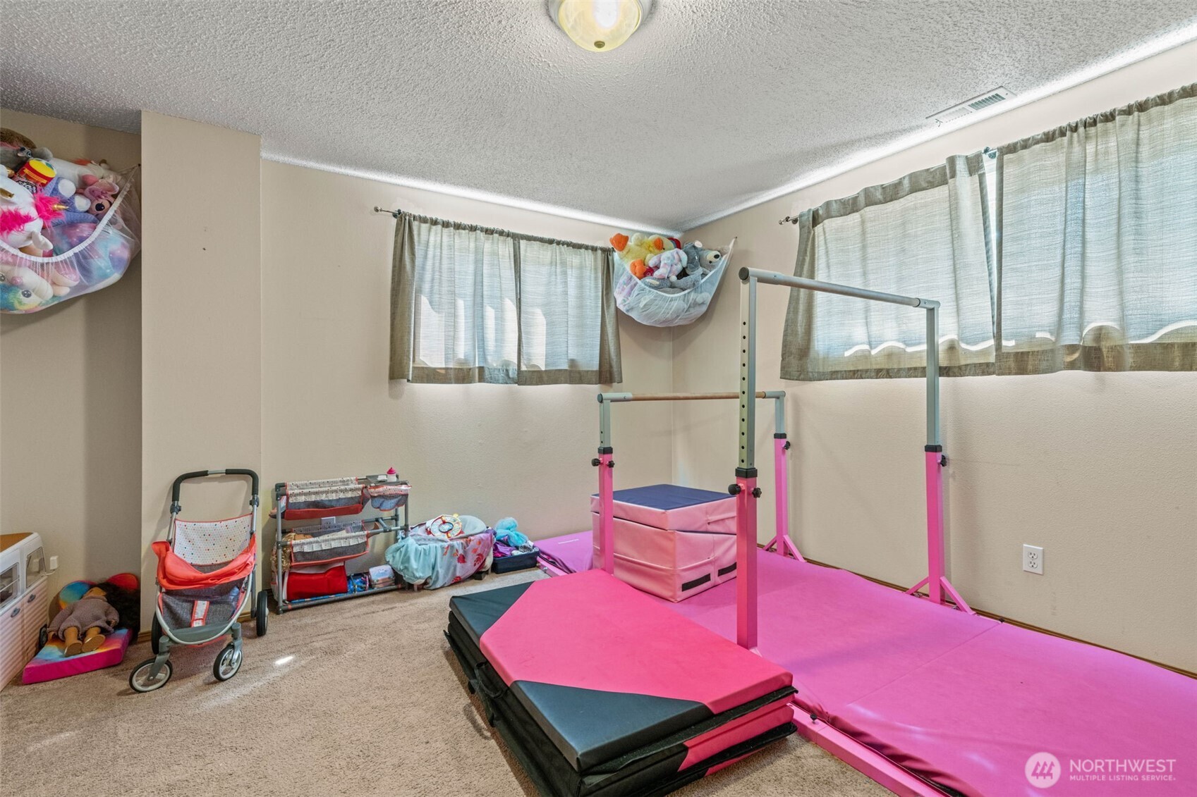 1420 Dundee Drive Cosmopolis, WA 98537 - Photo 21 of 40 a view of a room with chairs and toys