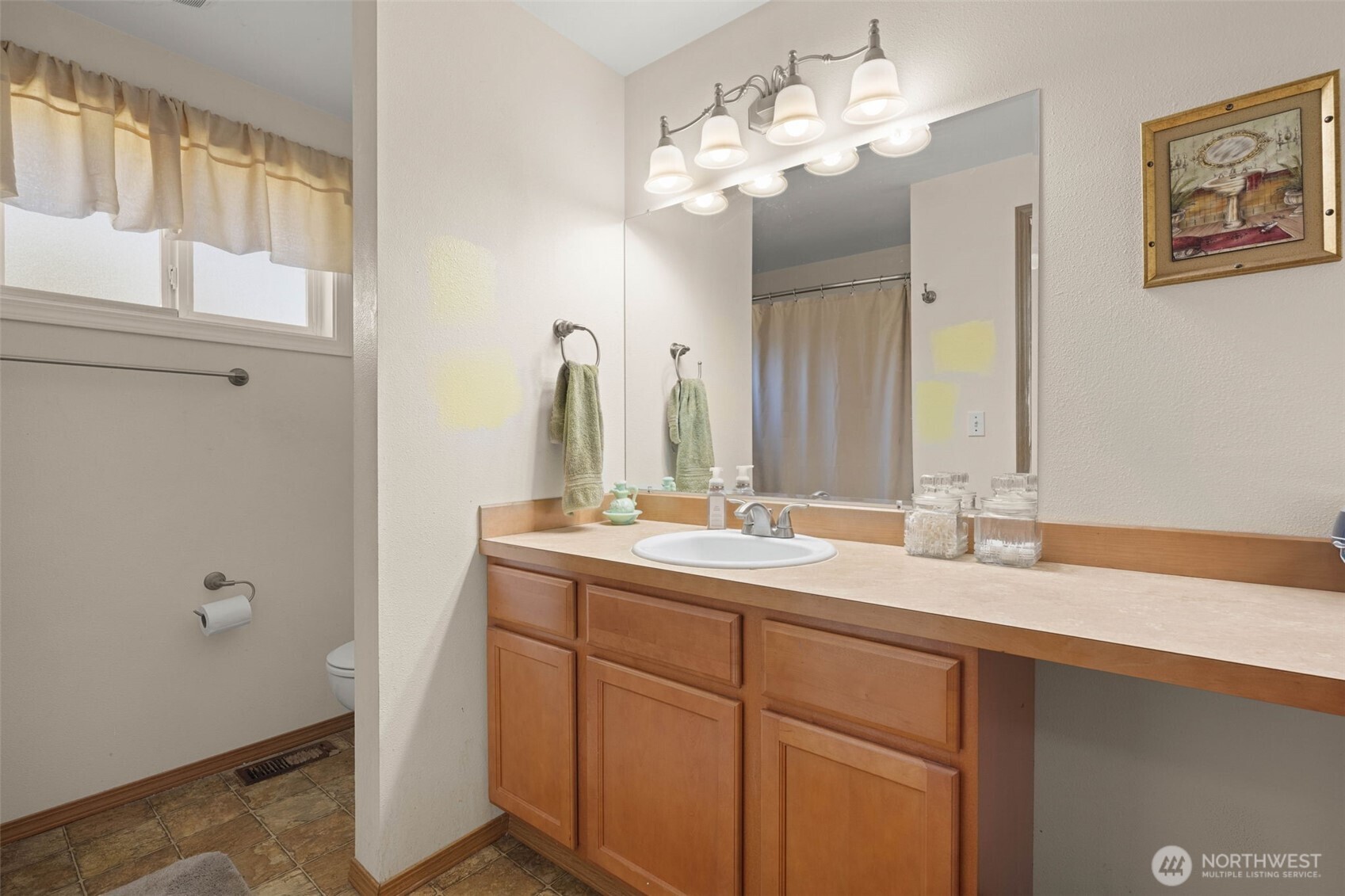 1420 Dundee Drive Cosmopolis, WA 98537 - Photo 24 of 40 a bathroom with a double vanity sink and a mirror