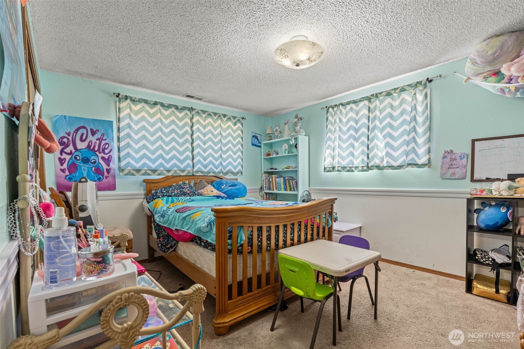 1420 Dundee Drive Cosmopolis, WA 98537 - Photo 26 of 40 a bedroom with a bed and a table in it