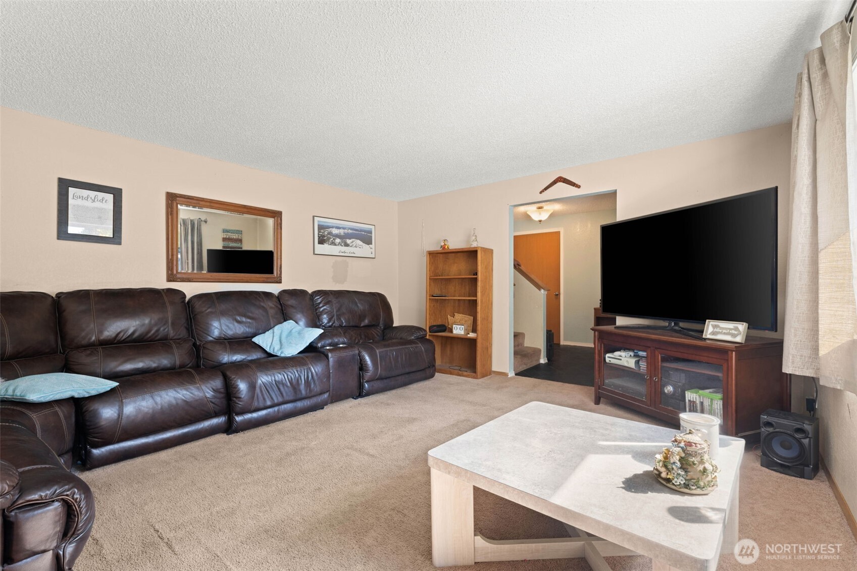 1420 Dundee Drive Cosmopolis, WA 98537 - Photo 6 of 40 a living room with furniture and a flat screen tv