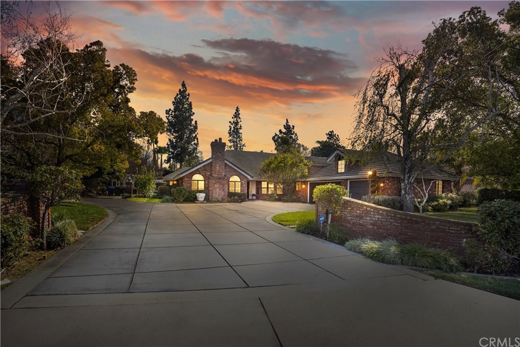 7115 Hawarden Drive Riverside, CA 92506 - Photo 1 of 1 a view of a house with basketball court