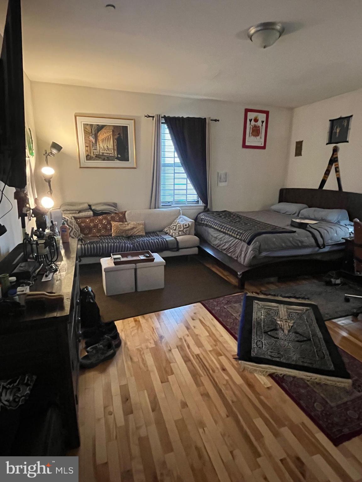 4010 Baring Street Philadelphia, PA 19104 - Photo 11 of 22 a bedroom with a bed and a dresser