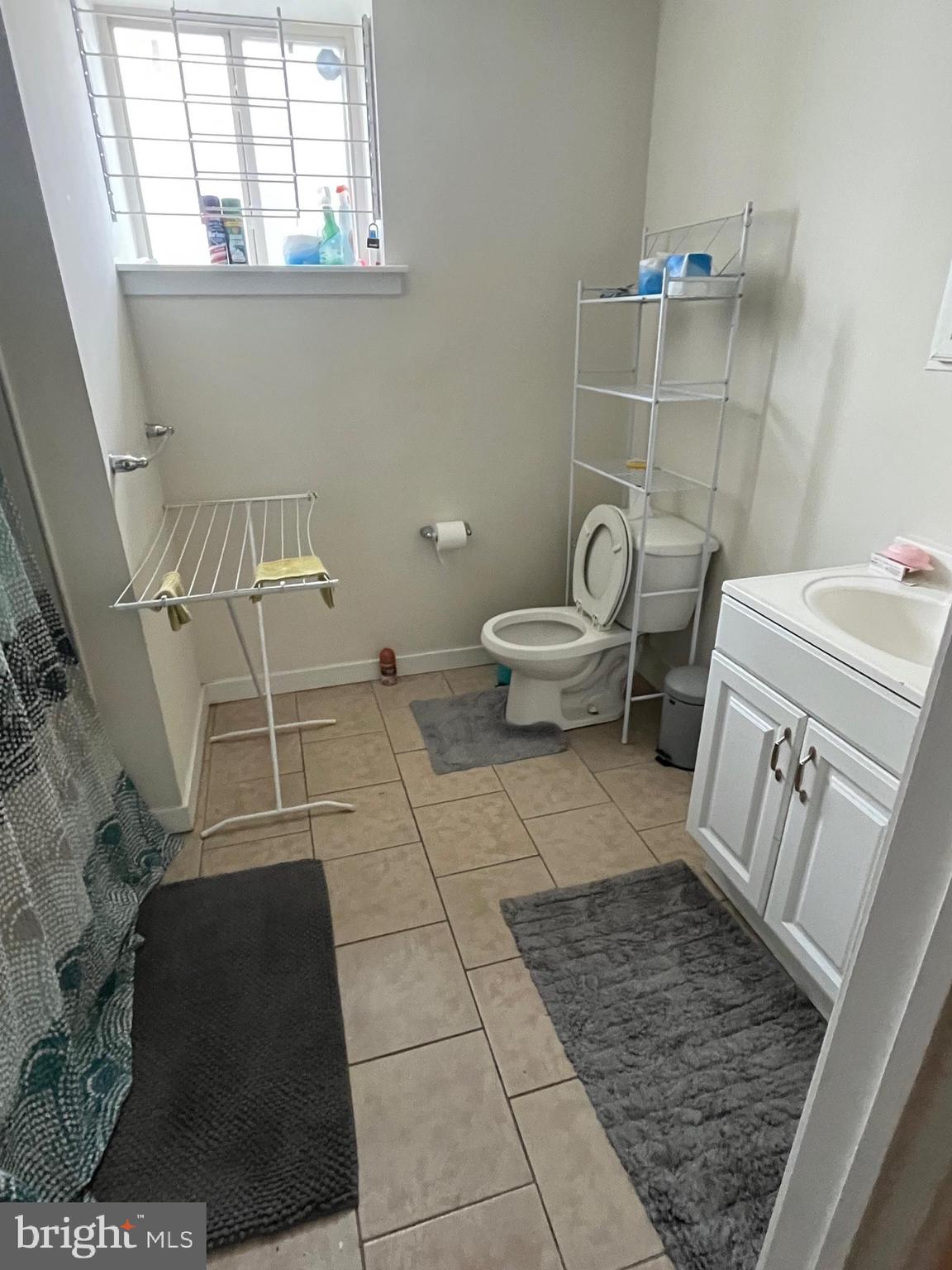 4010 Baring Street Philadelphia, PA 19104 - Photo 12 of 22 a bathroom with a toilet and a shower
