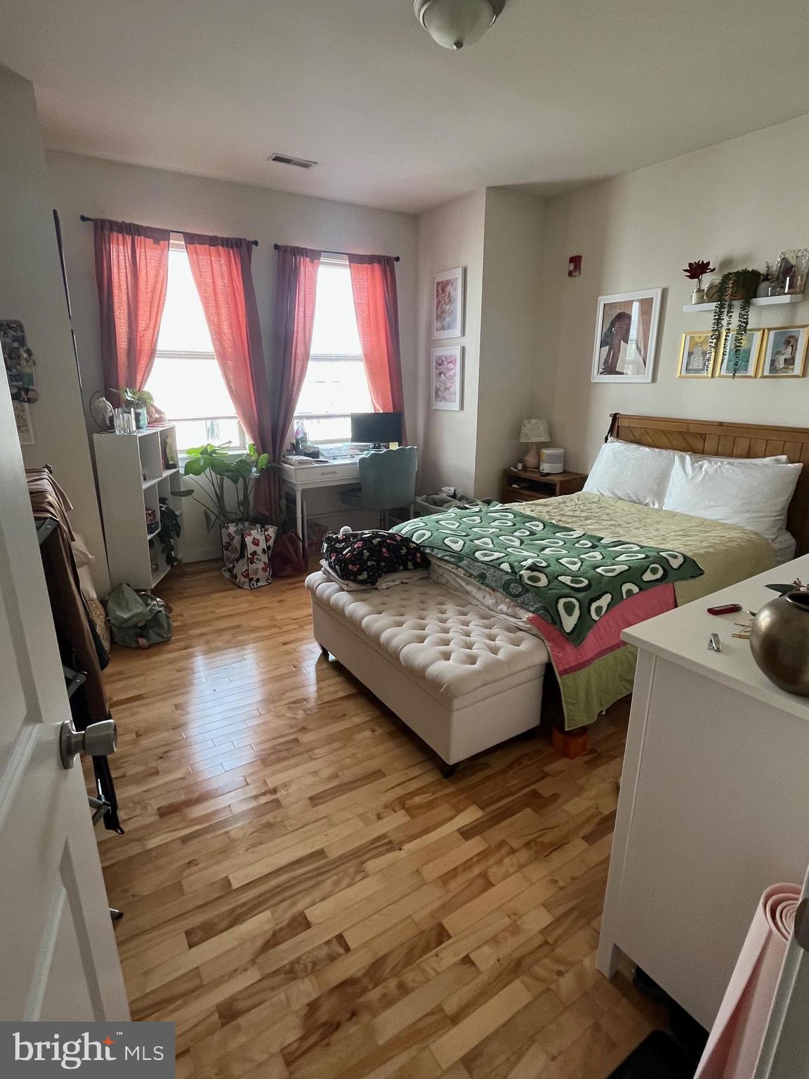4010 Baring Street Philadelphia, PA 19104 - Photo 16 of 22 a bedroom with furniture and a large window
