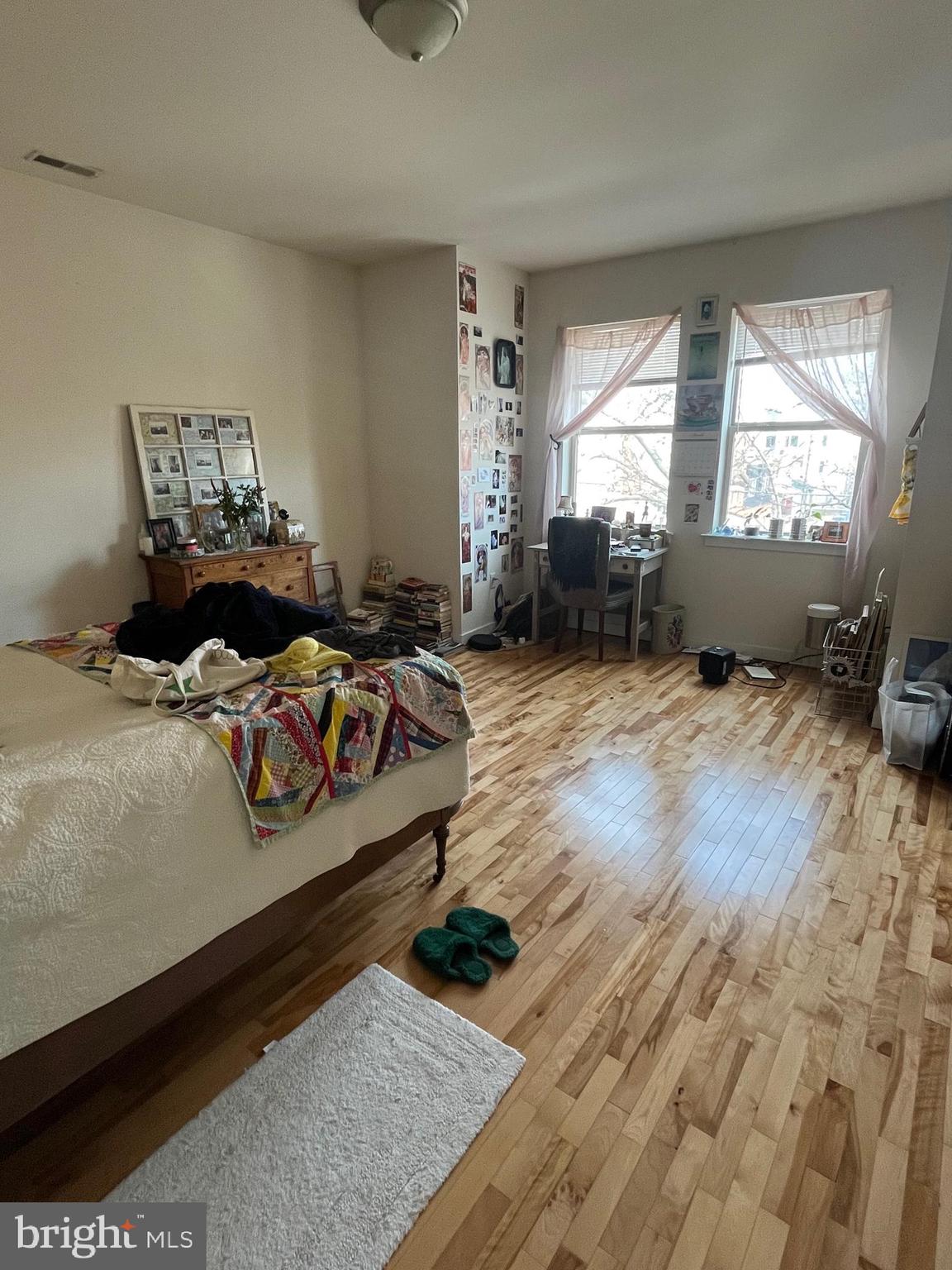 4010 Baring Street Philadelphia, PA 19104 - Photo 17 of 22 a bed sitting in a bedroom next to a window