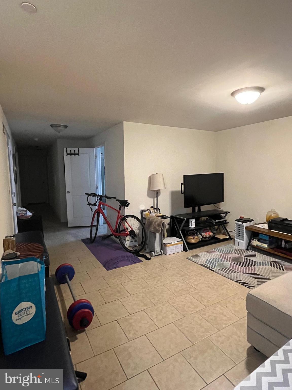 4010 Baring Street Philadelphia, PA 19104 - Photo 22 of 22 a view of a livingroom with furniture and a flat screen tv