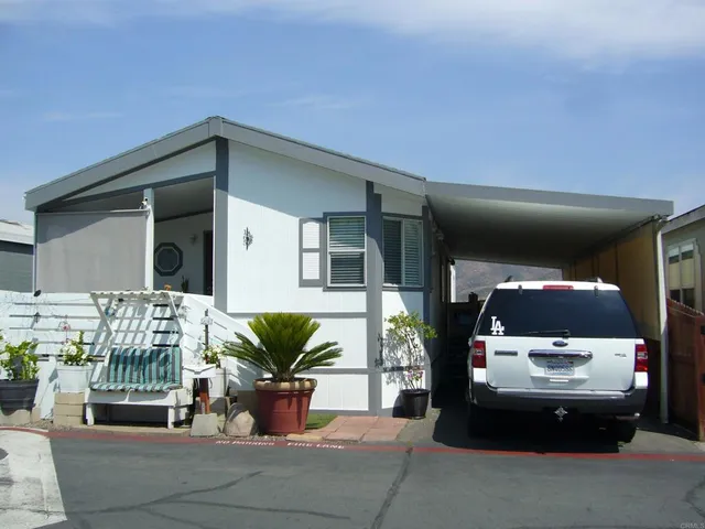 a view of balcony with wooden floor and stairs