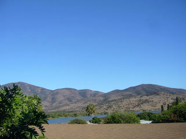 a view of mountains and valleys