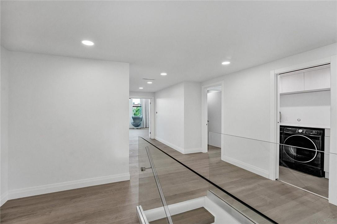 9 Tahoe Lane Sea Ranch Lakes, FL 33308 - Photo 42 of 54 a view of a hallway with stairs
