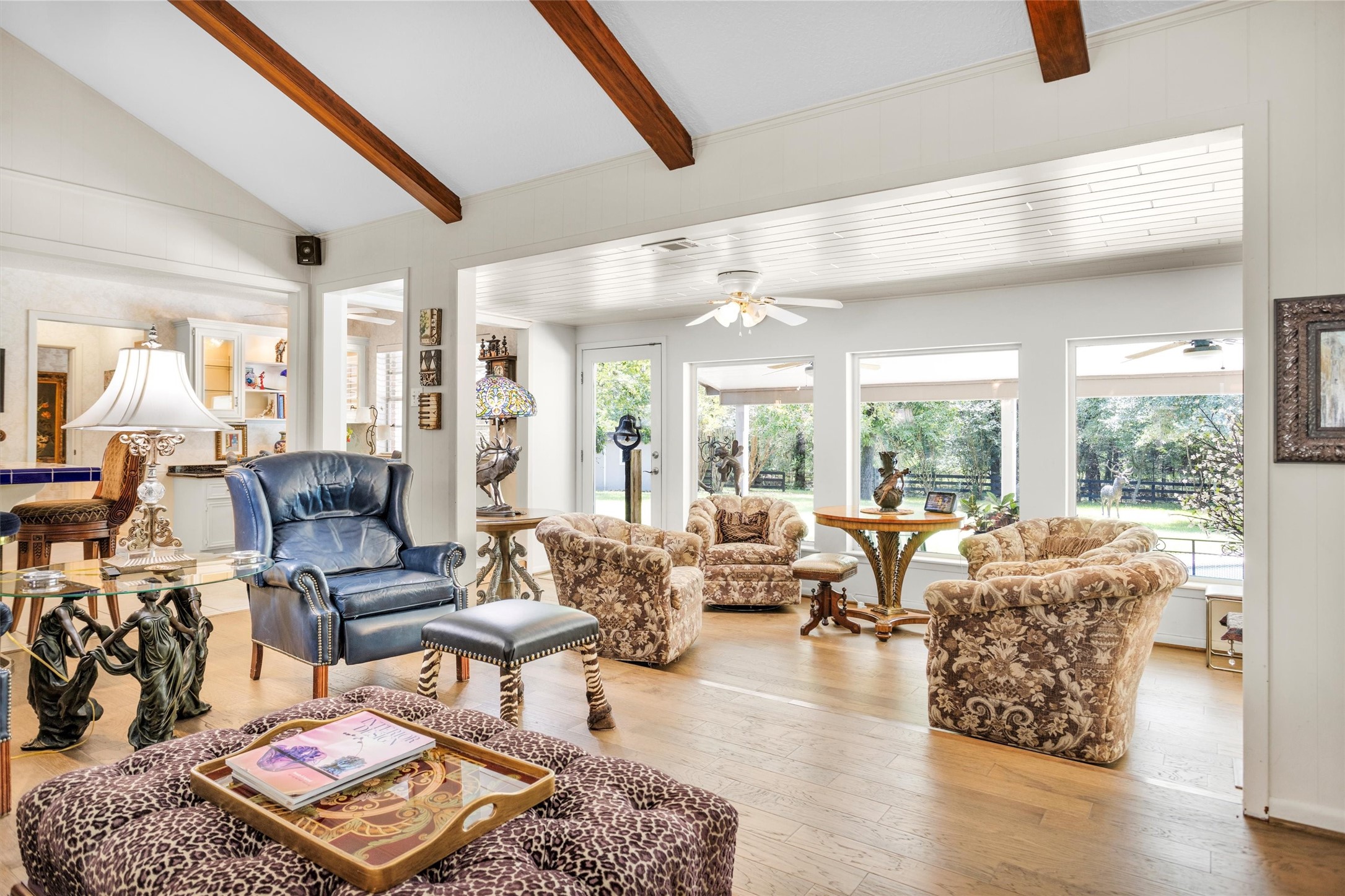 10135 Wahrenberger Road Conroe, TX 77304 - Photo 11 of 49 a living room with furniture and a large window