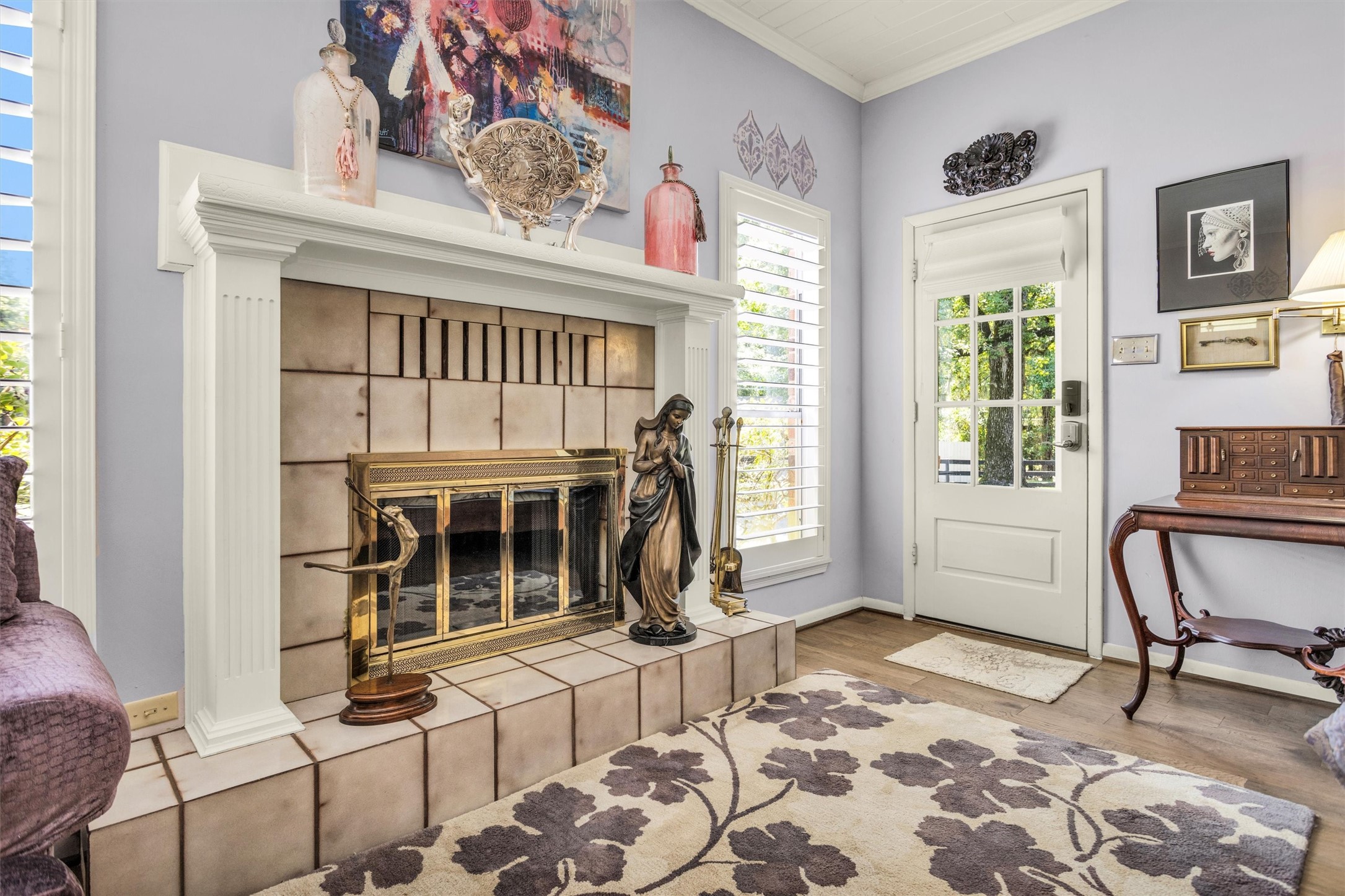 10135 Wahrenberger Road Conroe, TX 77304 - Photo 20 of 49 a living room with furniture a window and a fireplace
