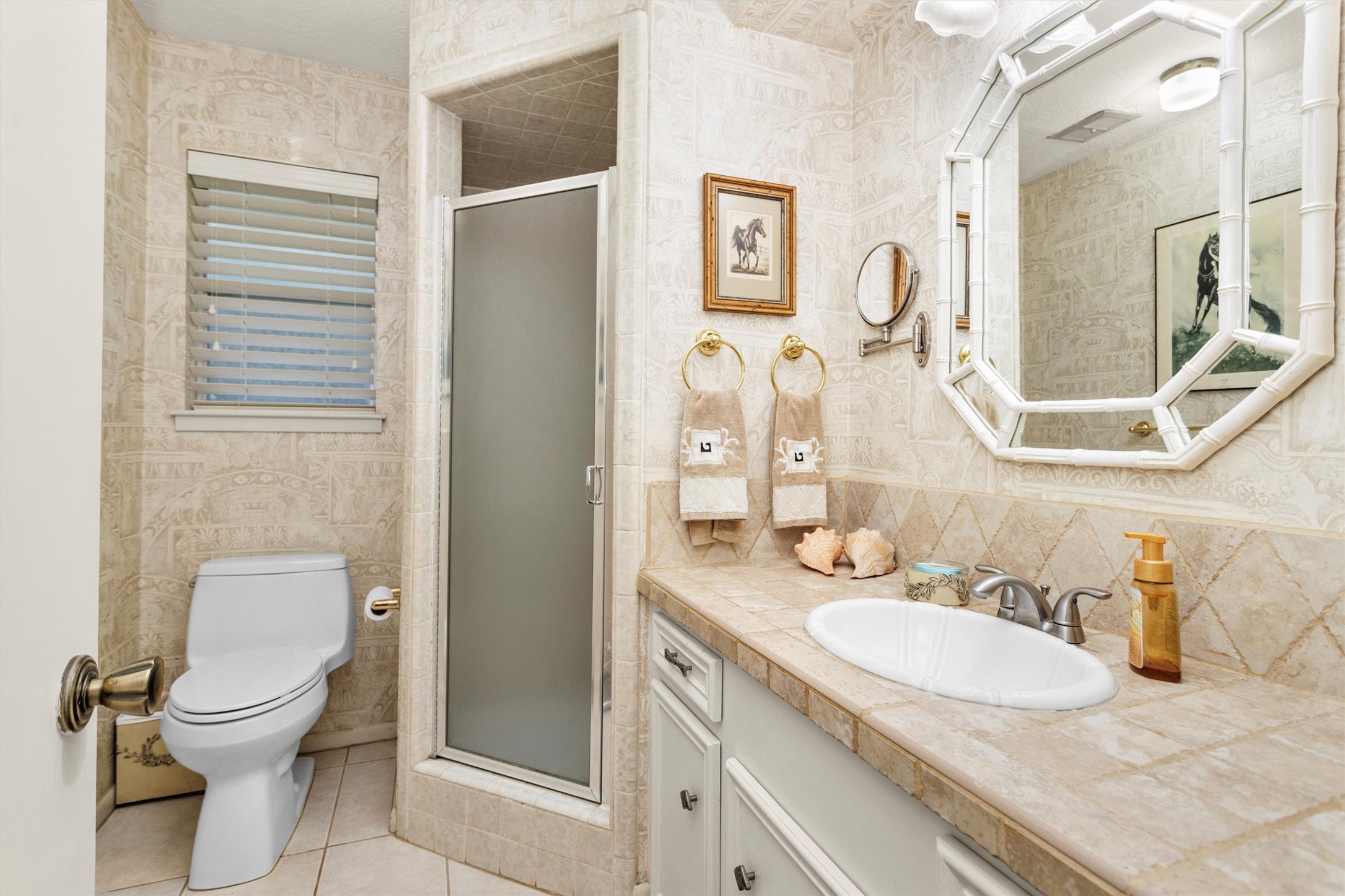 10135 Wahrenberger Road Conroe, TX 77304 - Photo 27 of 49 a bathroom with a granite countertop sink toilet and shower