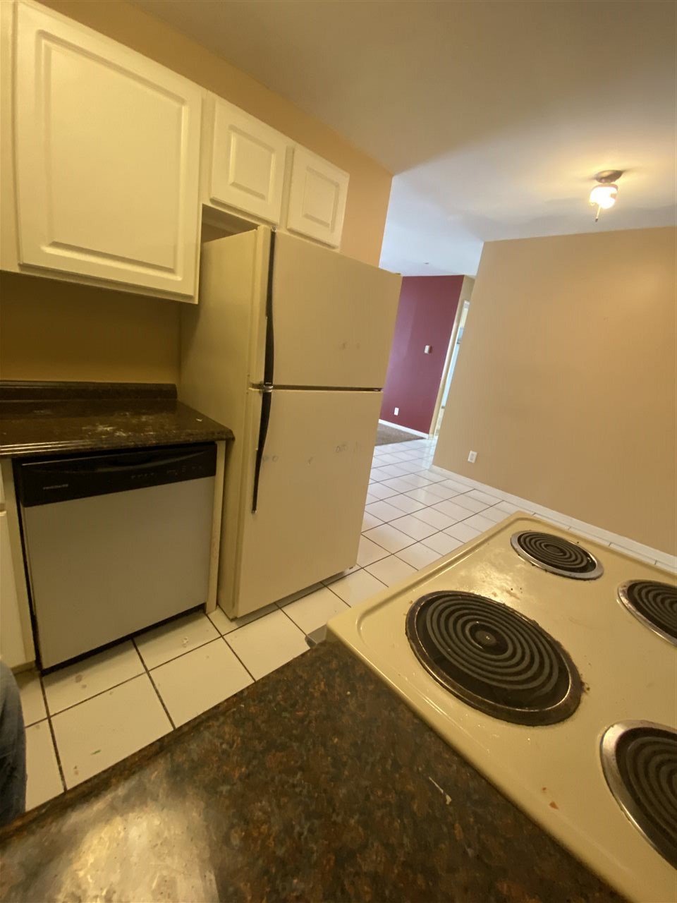 2000 Light Road Oswego, IL 60543 - Photo 13 of 16 a kitchen with a sink a stove and a refrigerator