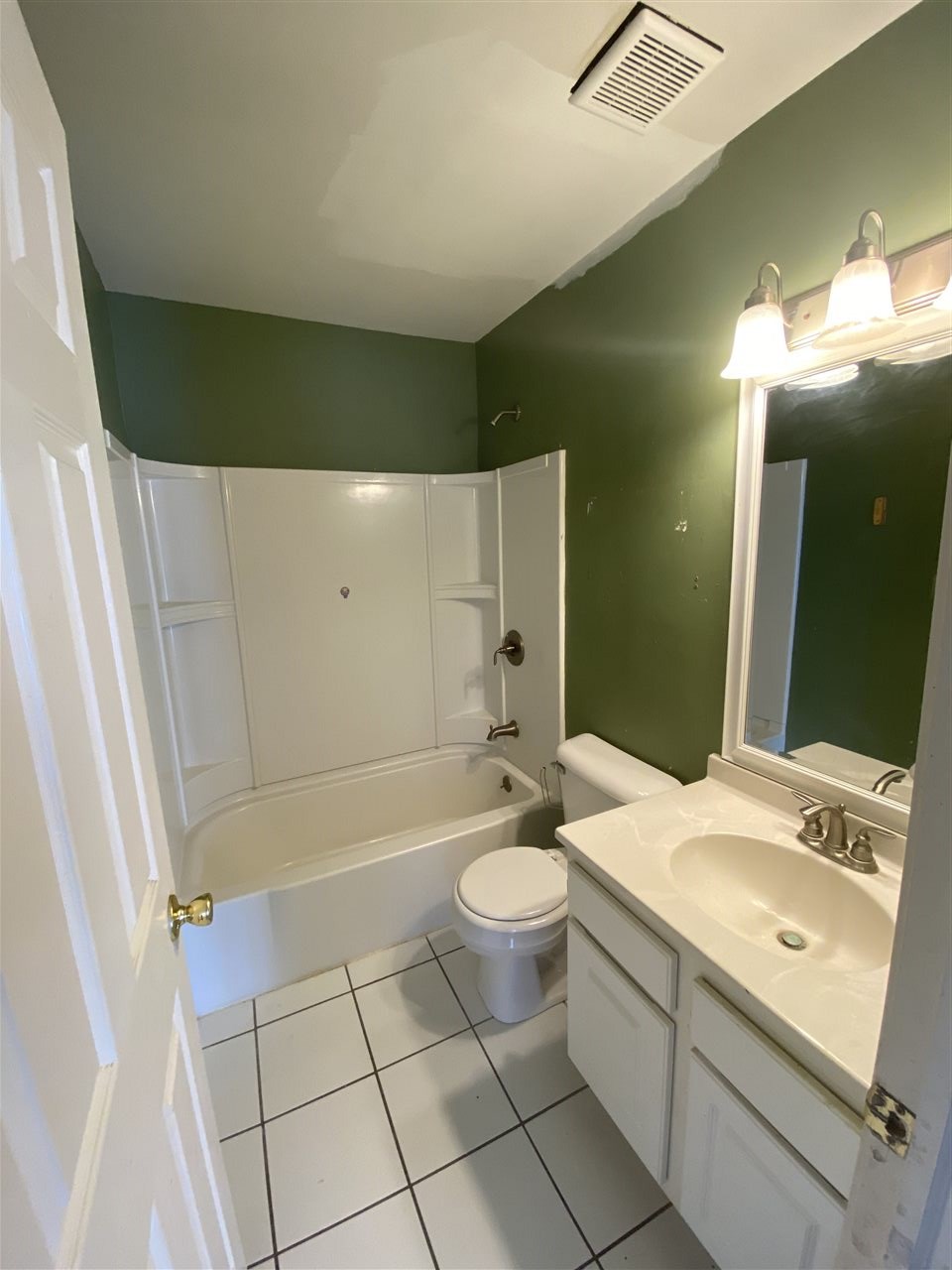 2000 Light Road Oswego, IL 60543 - Photo 15 of 16 a bathroom with a sink a toilet and shower