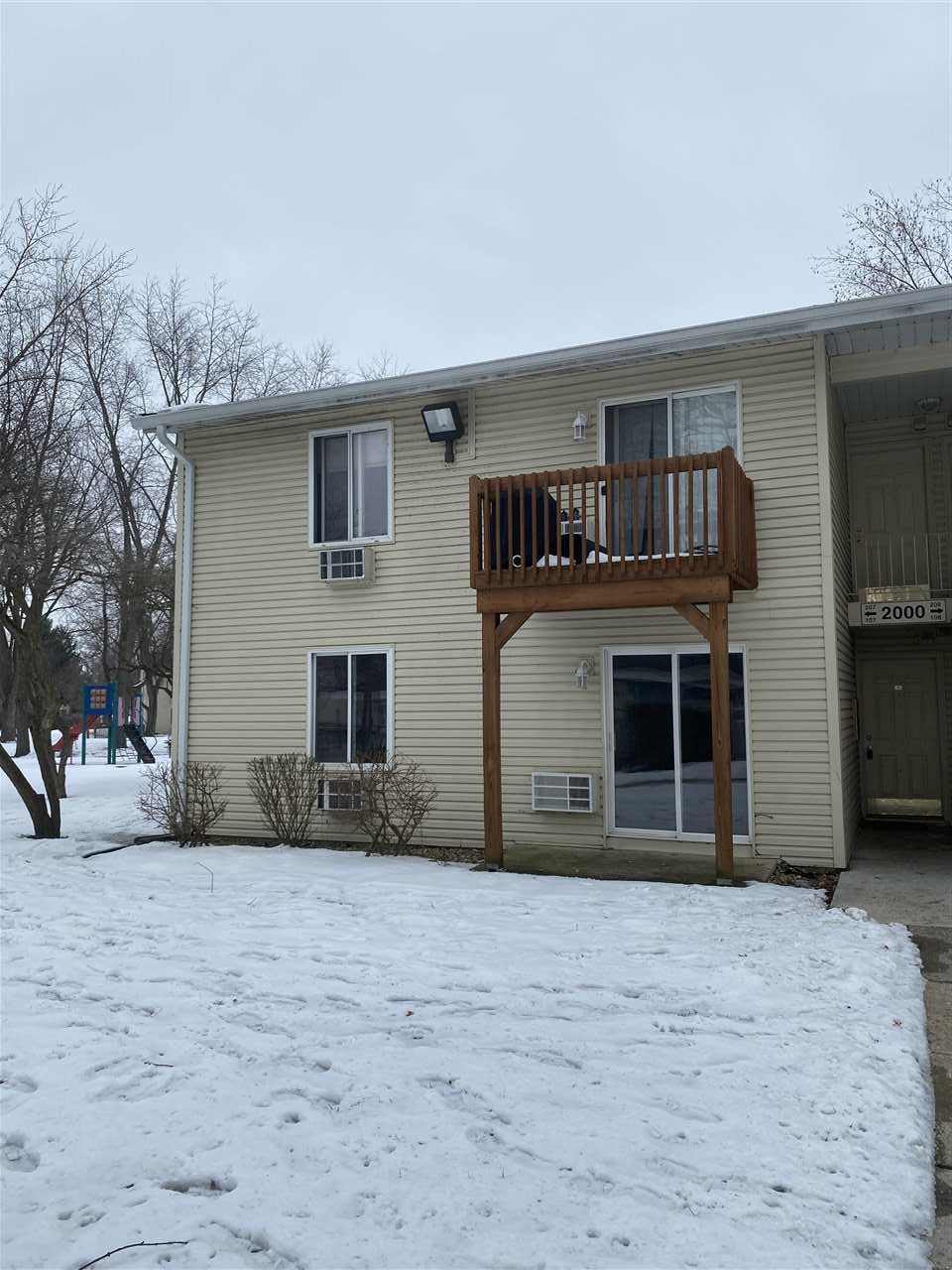 2000 Light Road Oswego, IL 60543 - Photo 16 of 16 a front view of a house with a yard