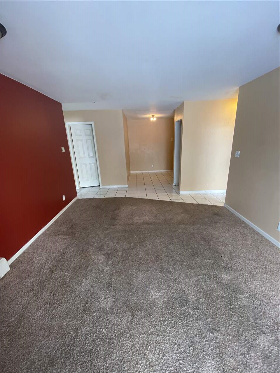 2000 Light Road Oswego, IL 60543 - Photo 6 of 16 a view of an empty room with wooden floor and a window