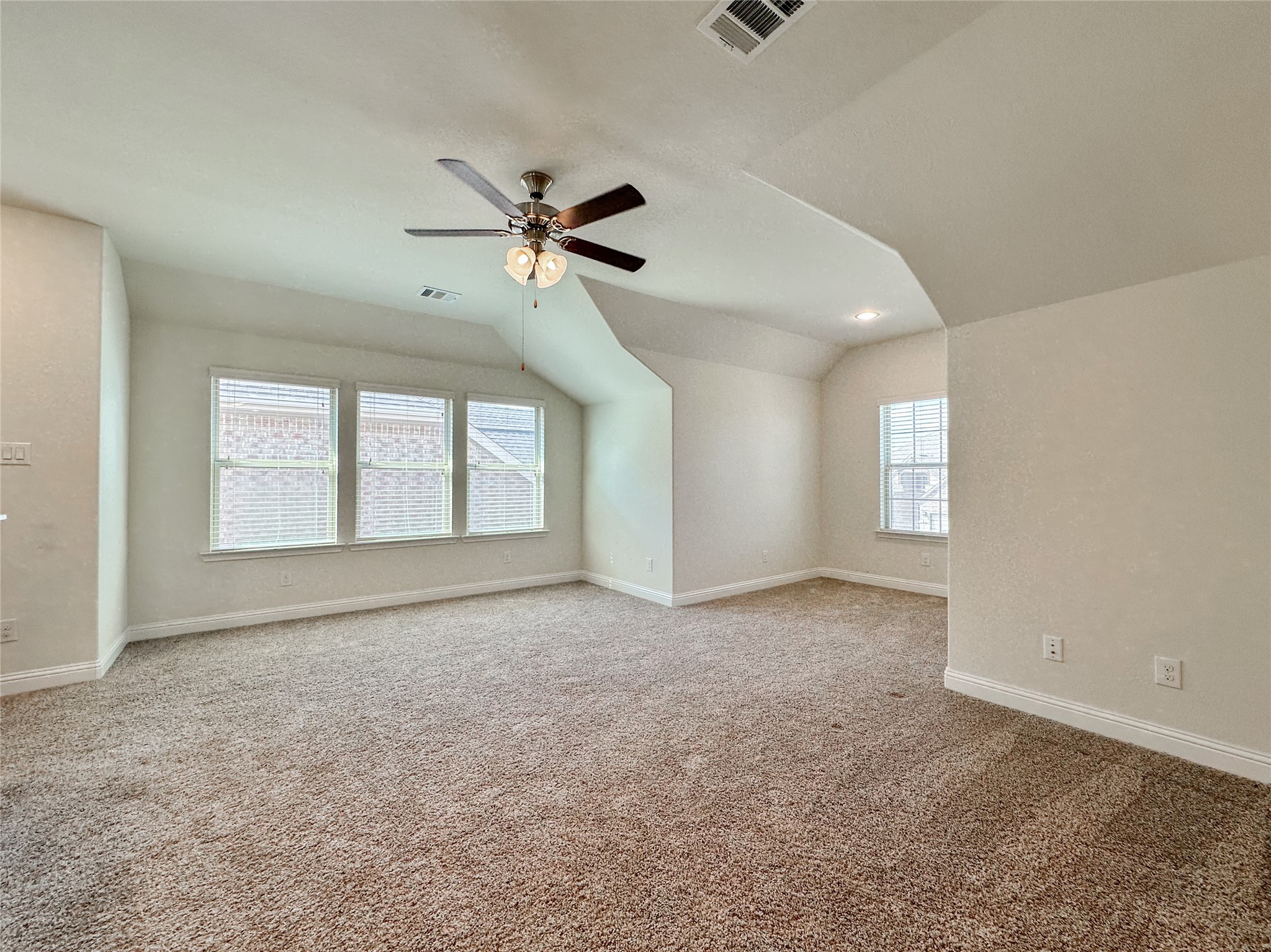 6715 Chicoma Street Spring, TX 77379 - Photo 19 of 20 a view of an empty room with a window