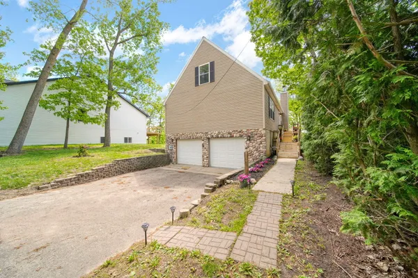 $599,000 | 10771 Woodbrook Drive, Cement City, MI 49233