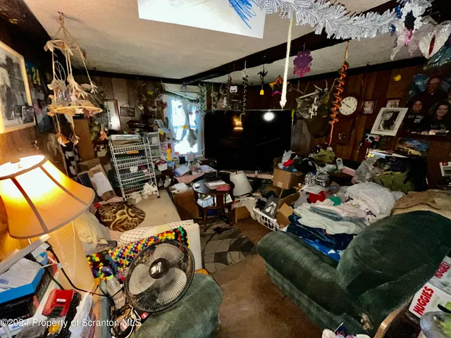 a room with lots of different colored cloths