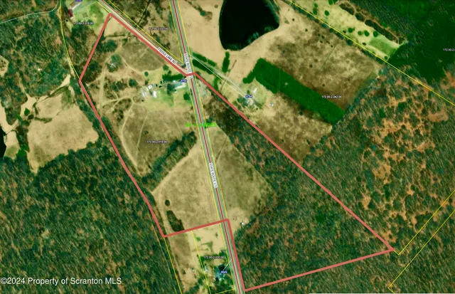 a view of swimming pool from a balcony