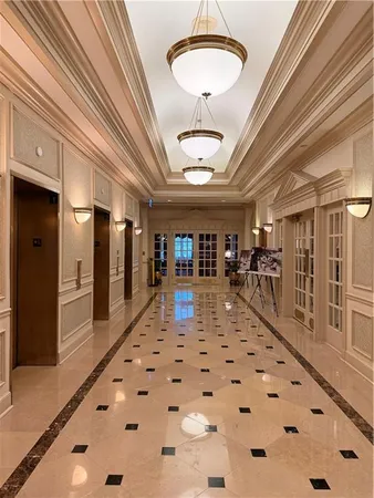 a view of a living room and a chandelier