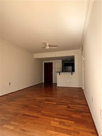a view of a kitchen from the hallway
