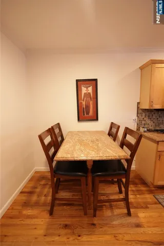 a view of a workspace with furniture